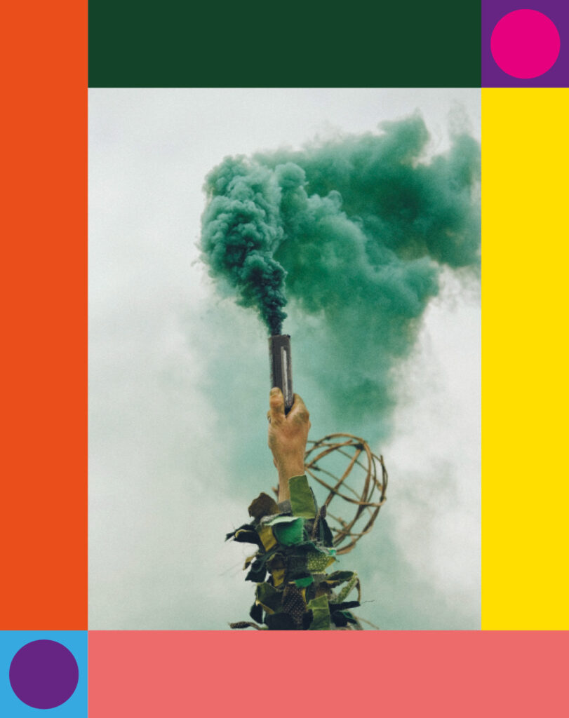 A design spread by Richard Robinson for Get Hastings Issue 5. Photo by Euan Baker of someone holding up a green smoke bomb